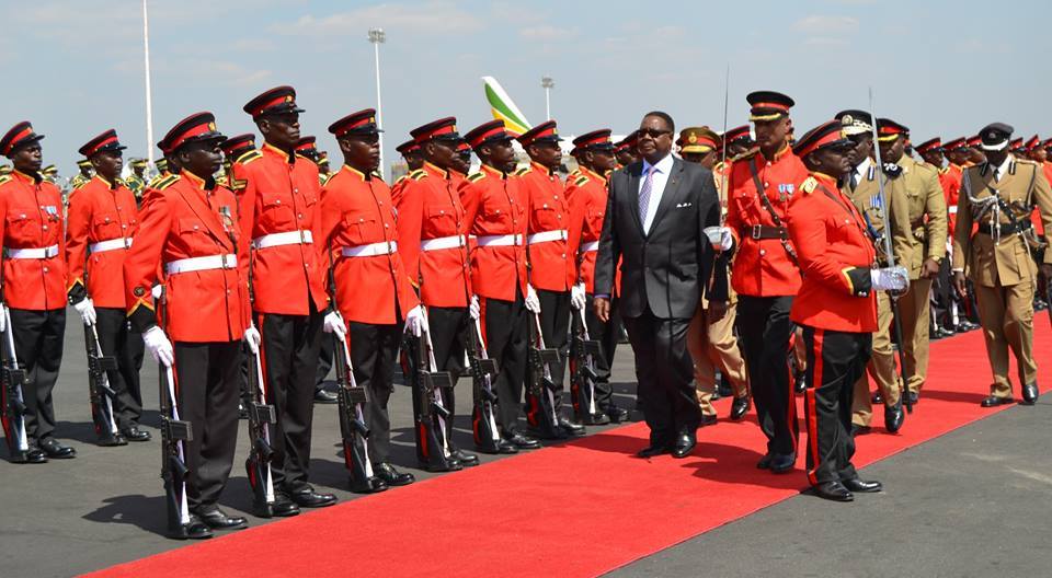 MUTHARIKA COMES BACK ON A CHARTERED PLANE
