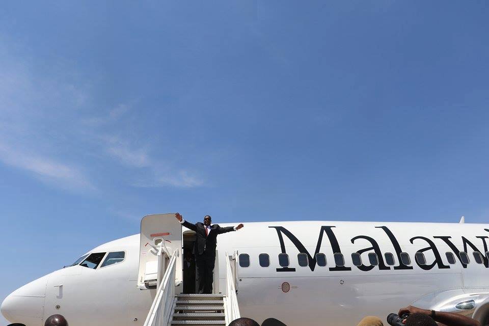 PRESSURE FORCES MUTHARIKA TO USE MALAWIAN AIRLINES