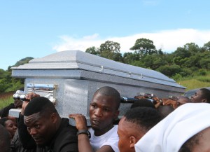 Musicians carrying the remains of Grace 
