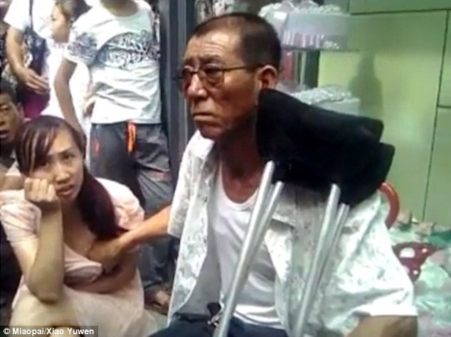 Meet a Chinese Man Who Claims He Can Tell Woman’s Fortune by Touching Her Breast (video)