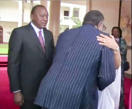 Kenyatta’s face twisted in jealousy after his wife being hugged by another man causes a stir online