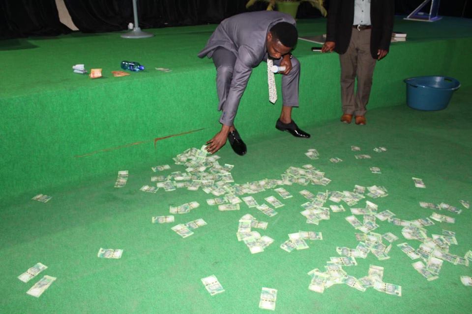 South African Prophet Vomits Money During Church Service