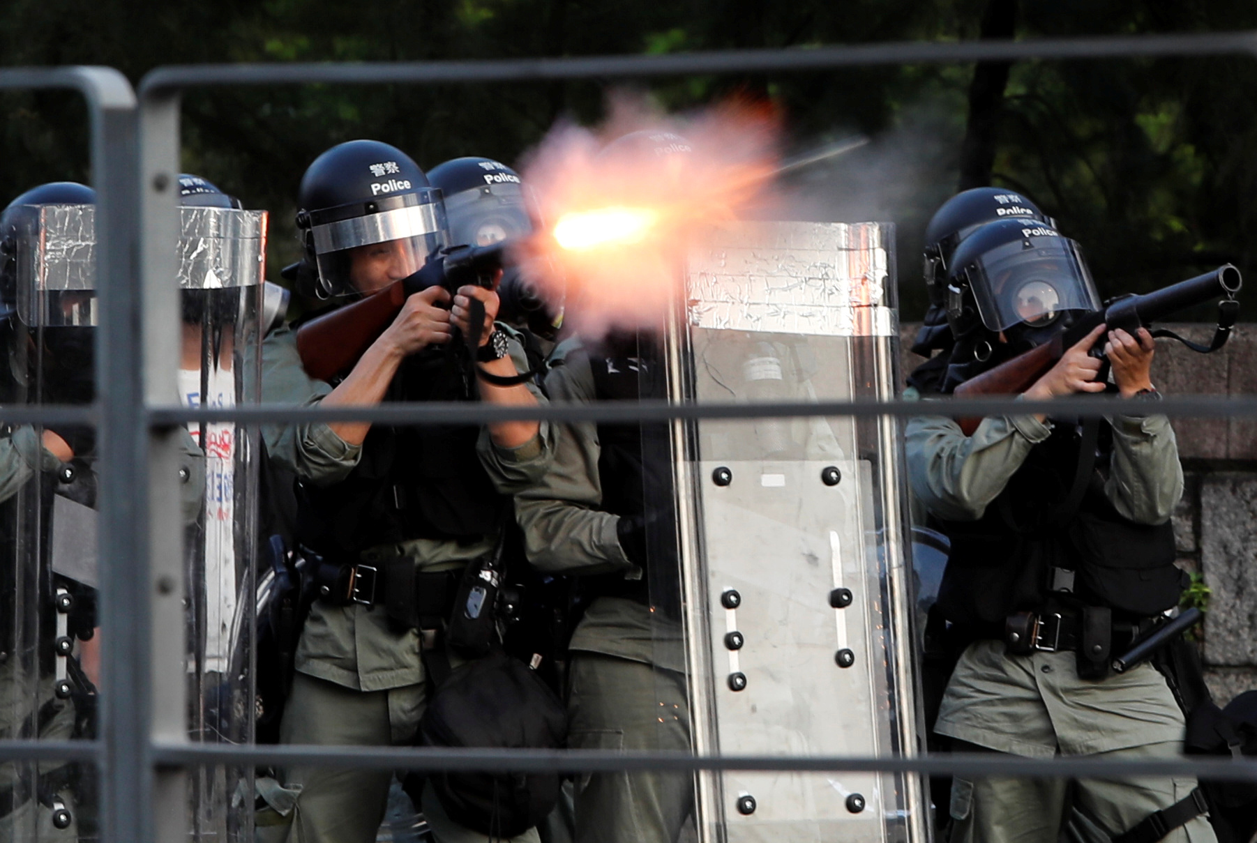 Hong Kong police fire tear gas, rubber bullets as strikes paralyse city