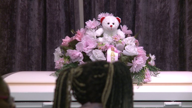 Baby Found Dead in Oven Laid to Rest, Grandmother Charged