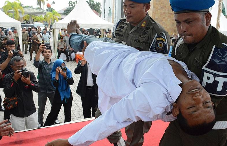 Indonesian Man Faints as he is Caned for Having Pre-Marital Sex