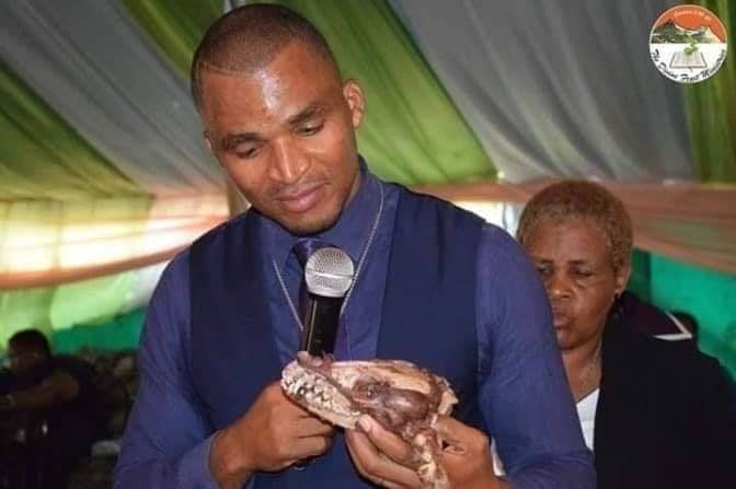 Pastor kills Dog, Eats it Raw in Church, Feeds it to Members in Botswana (See Photos)