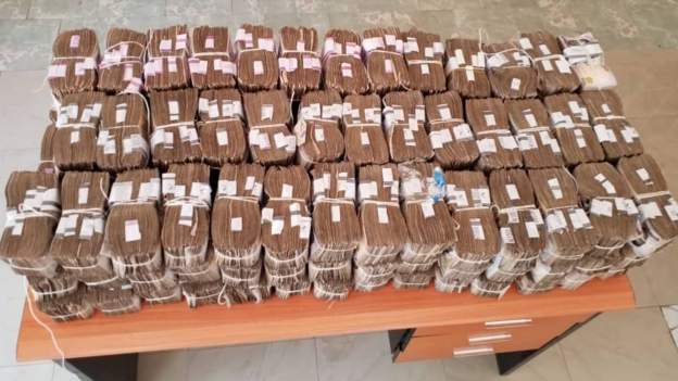 Chinese nationals arrested with $250,000 bribe in boxes