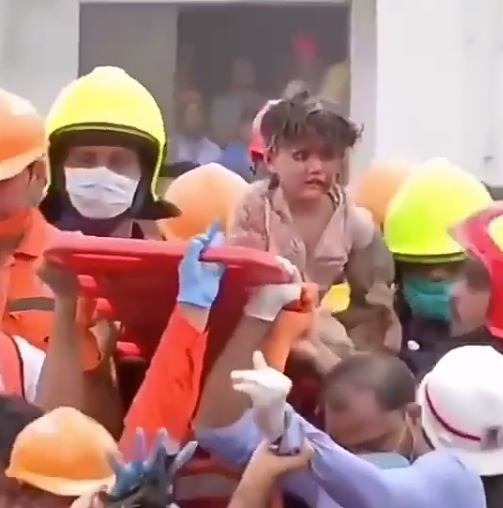 4-year-old boy buried alive in collapsed apartment, pulled out alive nearly a full day later (video)