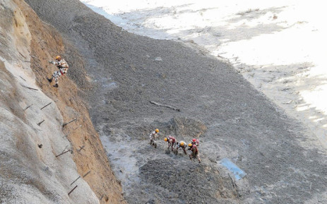 FIRST BODIES RECOVERED FROM INDIAN FLOOD DISASTER TUNNEL