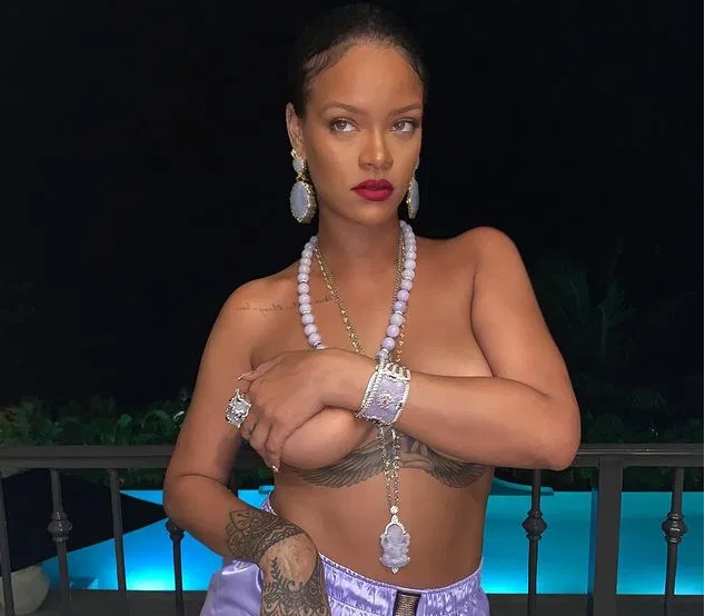 Rihanna Goes Topless In New Snaps (See Photos)