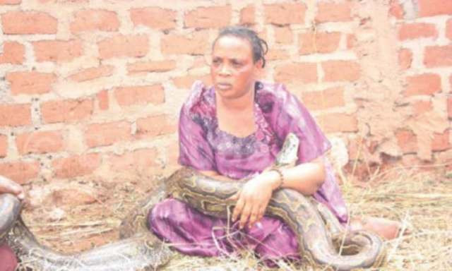 Zimbabwean Woman Caught Breastfeeding A Snake