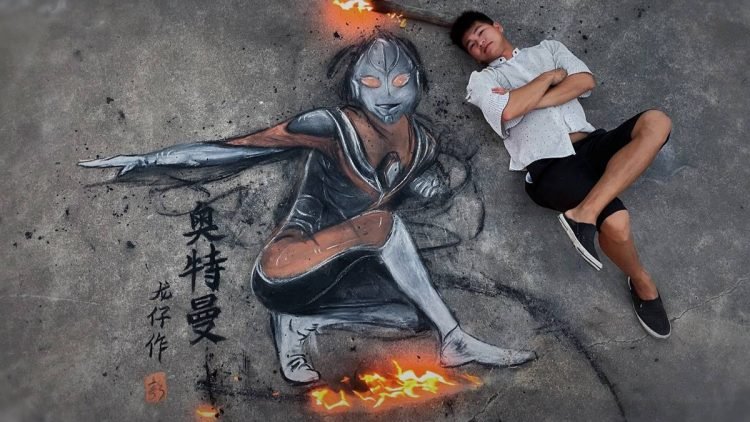 Street Artist Creates Beautiful Drawings With Burning Logs and Rocks