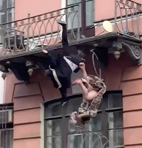 Couple fall off balcony together while arguing (See Photos)