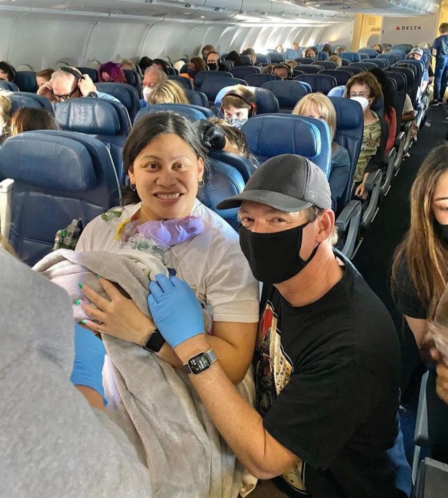 Lady who didn’t know she was pregnant gives birth on flight