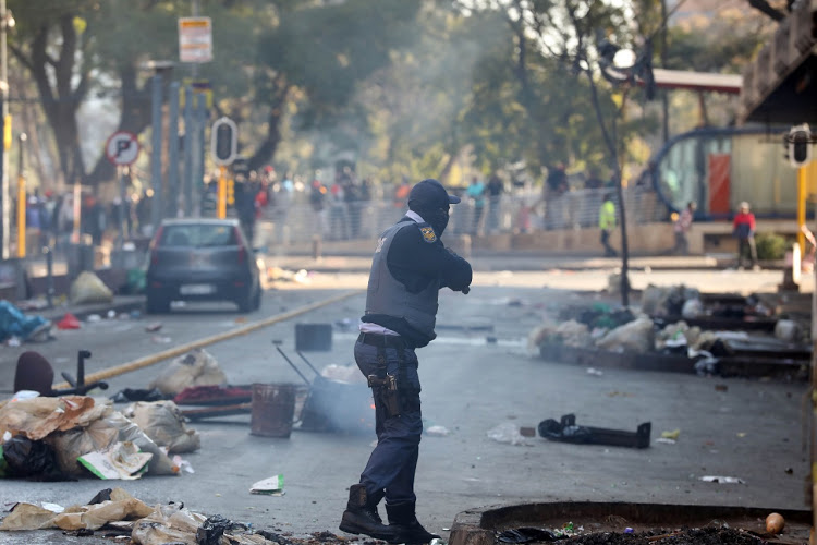 South Africa to increase troop deployment to 25,000 as unrest grows