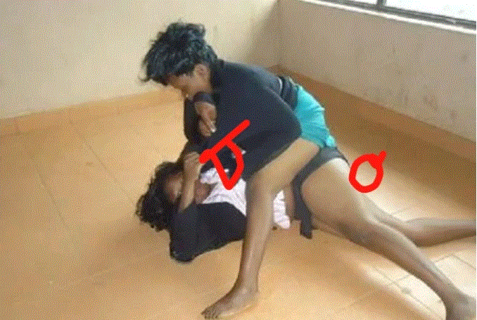 Two female teachers fight over a male teacher during assembly