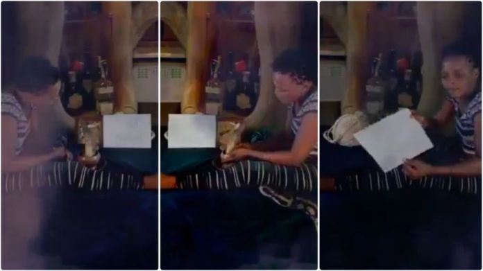 Woman records herself bewitching lady named Portia, as huge python moving all over her