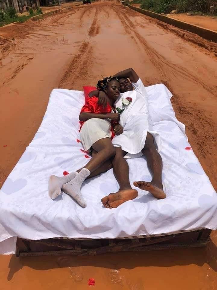 Nigerian Couple holds romantic honeymoon session on a mud-filled road (See Photos)