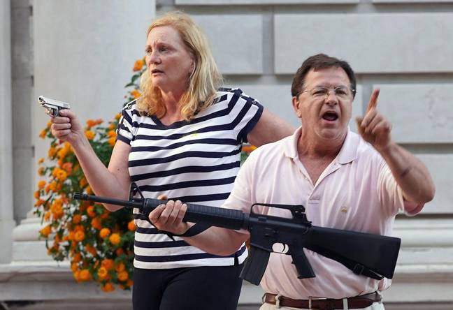 Couple Who Waved Guns At Protesters Want Their Weapons Back
