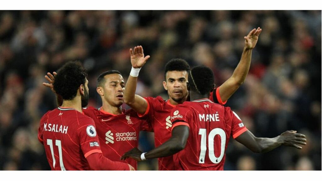 Ruthless Liverpool thrash miserable Man Utd to go top of Premier League