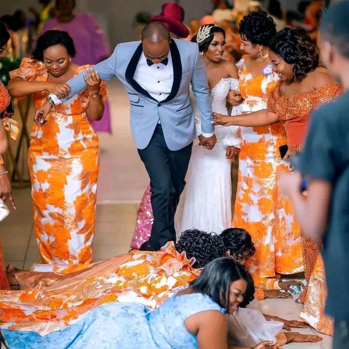 Drama As Newly Married Couple Walk On People During Their Wedding Ceremony (See Photos)