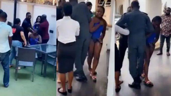 Watch As Angry Wife Disciplines Husband’s Side Chick After Catching Them In A Hotel