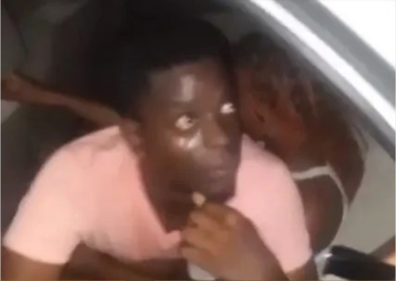 Drama As Couple Busted Chewing Each Other In A Car (Watch)