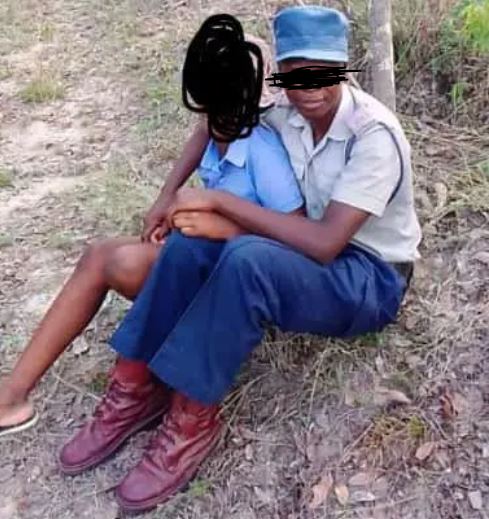 Scandal As Police Officer Is Caught In The Bush Chewing A School Girl – See Photos