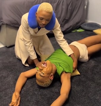 Watch As Nigerian Cross dresser, James Brown ‘cries’ profusely as he mourns late Queen of England (video)