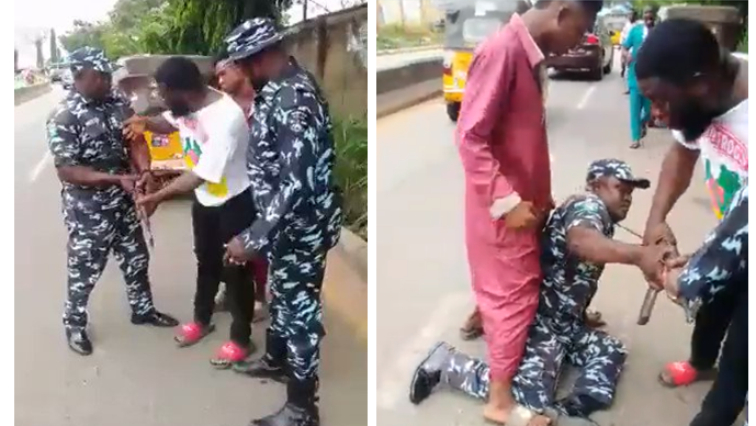 Watch As Two Nigerian Men Try To Seize Police Officer’s Rifle, Arrested