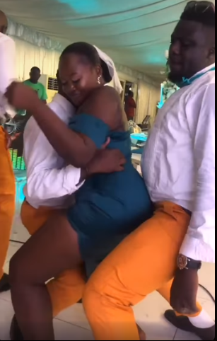 Bridesmaids Caught On Camera Grinding Each Other During Wedding Ceremony (Watch Video)
