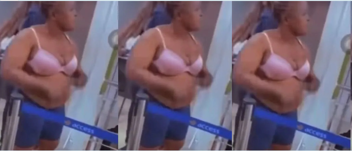 Drama As Woman Strips At Banking, Demands That Her ‘Missing Money’ Be Returned (Watch Video)