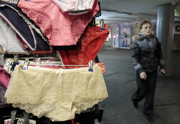 Woman beaten by her neighbor for selling underwear to her husband, gets accused of having affair with him