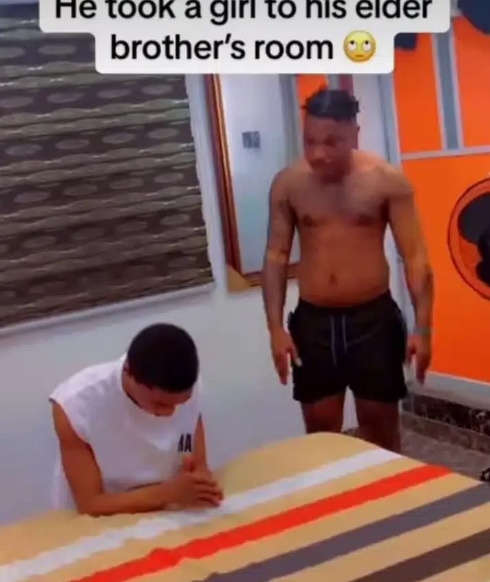 Man Blows Hot After Catching Junior Brother With Lady On His Bed (Watch Video)