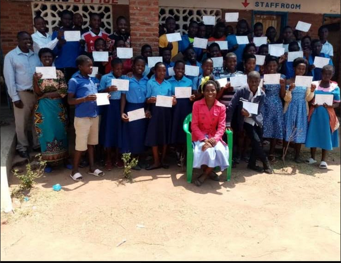 Headteacher awards PSLCE exams best performers at Mbidi Primary School in Zomba