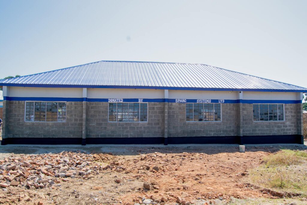 Sparc System Founder Hand Over School Blocks to Kiwe Primary