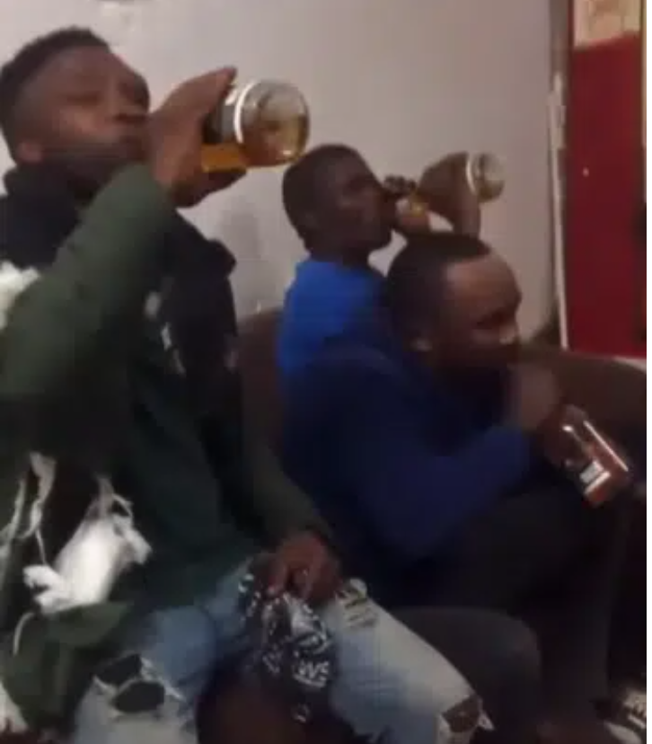 Watch Moment thieves forced to drink crates of alcohol they stole from a shop in South Africa (Video)