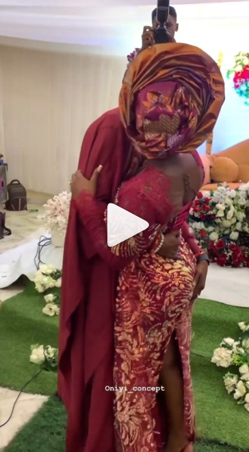 Too Serious Groom Grabs His Bride’s Nyash As They Share Passionate Kissing During Wedding Reception (Watch Video)