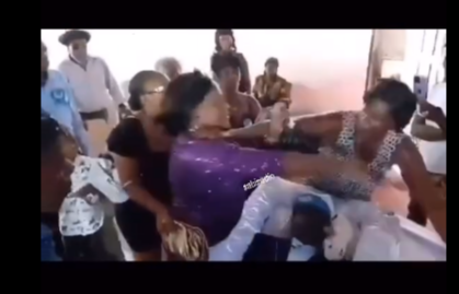 Drama as wife and side chic fight dirty at funeral of man (Watch Video)