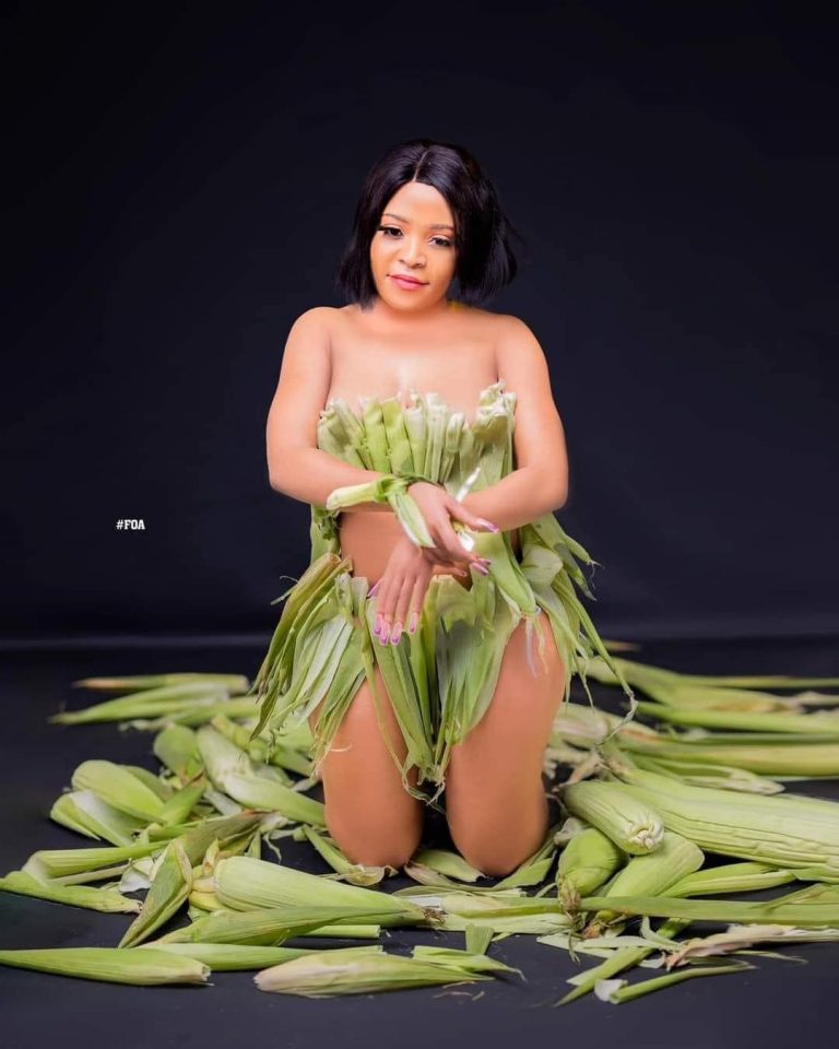 Malawian Woman Goes Viral After Posting Photos While Covered In Maize Stocks (See Photo)