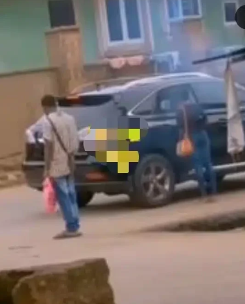 What would you have done? Boyfriend seen patiently waiting as girlfriend exchanges phone number with rich guy (Watch Video)