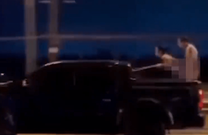 SCANDAL|| Couple Caught On Camera DOING IT At The Back Of Speeding Vehicle (Watch Video)