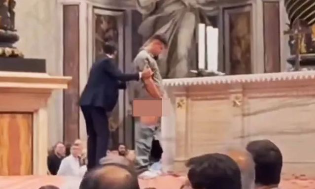BIZZAIRE|| Man ‘urinates’ on sacred Vatican altar in front of hundreds of horrified tourists (video)