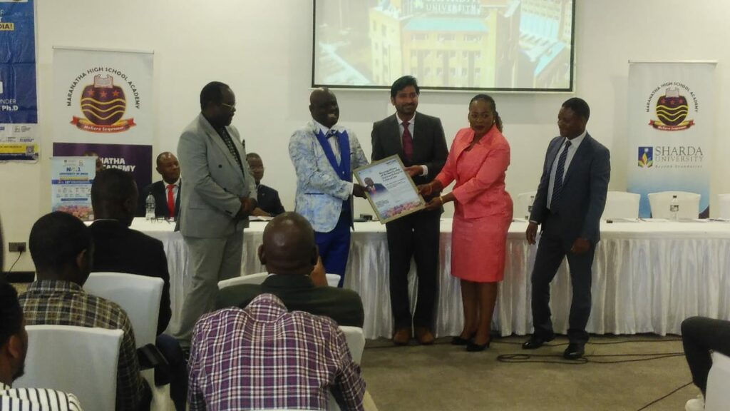 Sharda University Honours Dr. Ernest Kaonga of Maranatha Academy