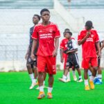 Red Lions Sign Manchester Motor Spares Star Latif Sharif on Loan